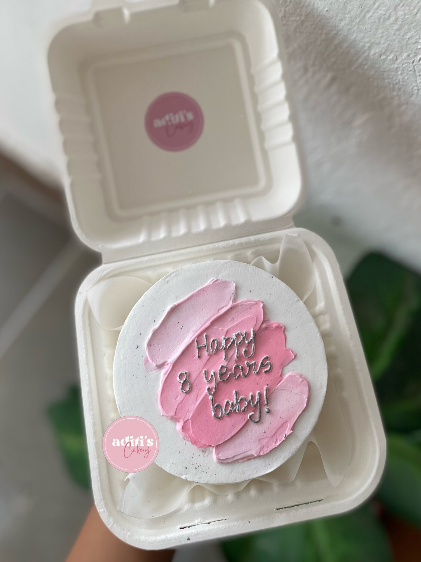 Pink bento cake in a clamshell box