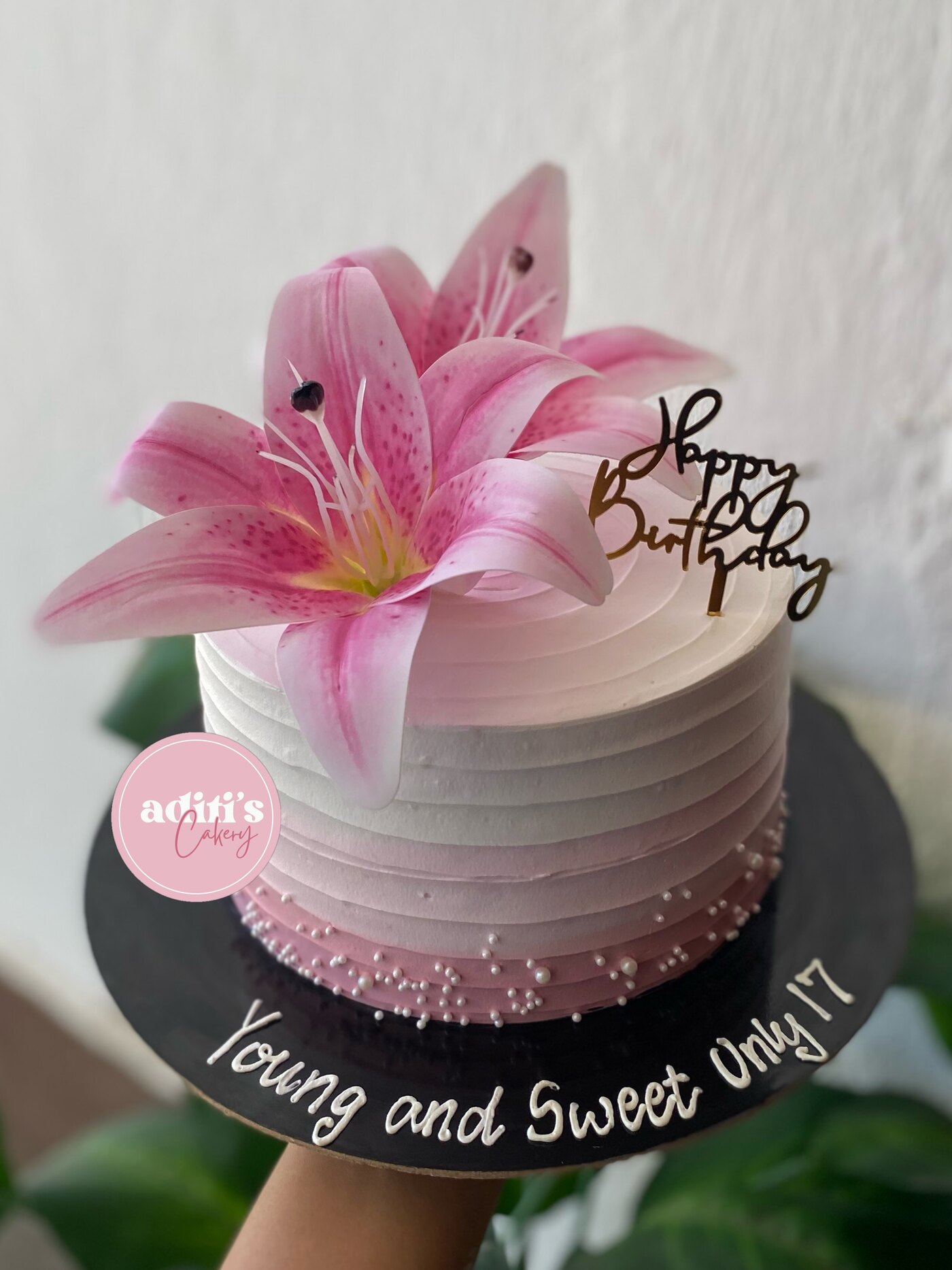 Pink lily birthday cake